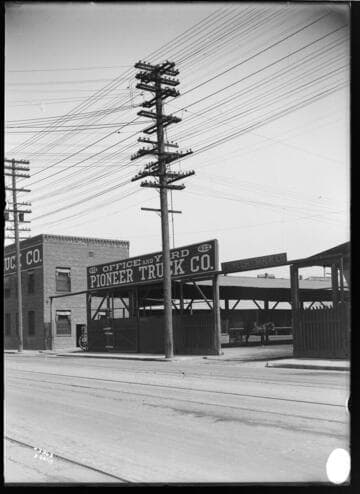Distribution Lines - Joint Pole Construction at 422 North Alameda Street. [Shows Pioneer Truck Co