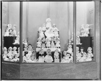 Display of dolls with clothes made in contest at Edison