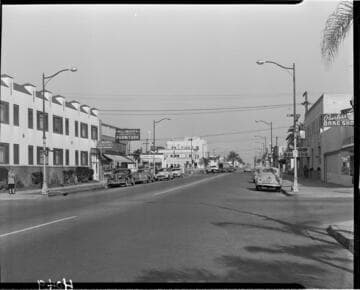 Street lighting in a business district on road near Atlantic Ave