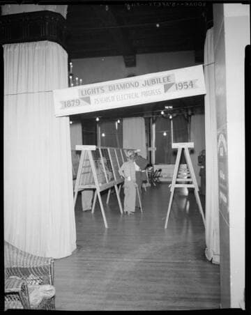 Stamp exhibition at a fraternal organization hall with display on Light's Diamond Jubilee