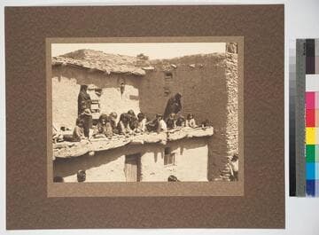 Hopi women and children in pueblo of Oraibi, 1890