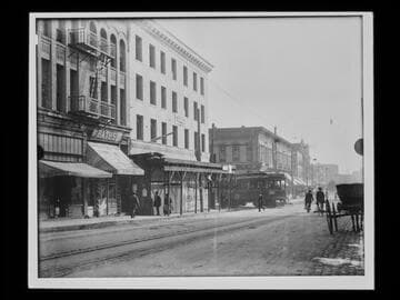 Pacific Electric Railway streetcar on unidentified street, Los Angeles