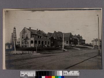 Oil wells and residences on Alvarado Street, Los Angeles