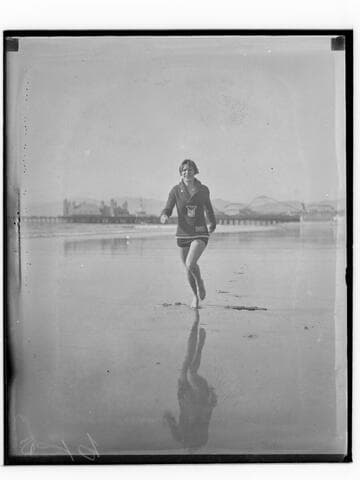 Lily May Bowmer jogging on the beach near Santa Monica Pier, California