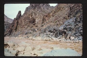 Down to foot of 234 Mile Rapids from Mile 233.7 left bank