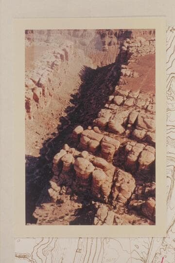 The graben that drains into Lower Red Lake or Butler Canyon about one mile from the Colorado River.  Note the small pointed rock in the far end of the shadow which is the same that appears in 5610 CTCN 213.4