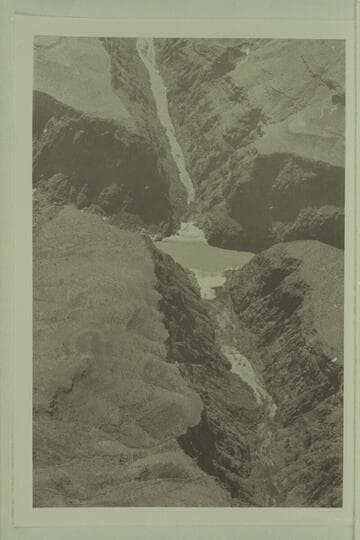 Looking southwest to mouth of Separation Canyon and Colorado River.  The beach on the far side of the river is the campsite of the Powell party of 1869, Aug