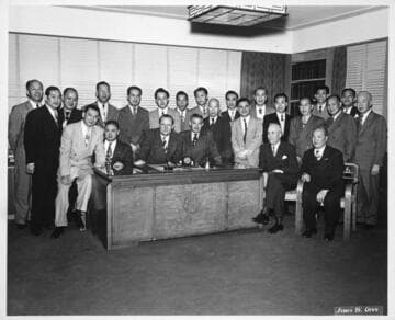 William Knowland and group of men in Y. C. Hong's office