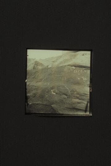 The sign and the inscription at Browns Riffle.  Mile 12.  Marble Canyon