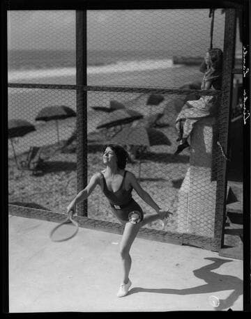 Linda Landi playing tennis at the Sea Breeze Beach Club, Santa Monica