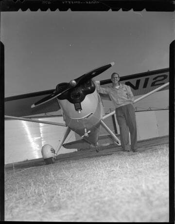 Man with single engine private airplane  with 9 variants, mostly aerial views of plane in flight