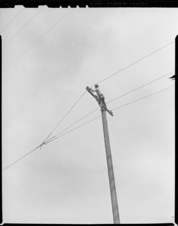 Edison linemen constructing a distribution line