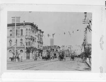 View South on State Street from Canon Perdido, Santa Barbara, about 1890, showing one of the wooden arc-light poles at the far right of the photo