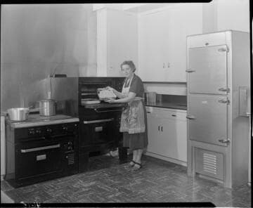 Woman baking in a commercial kitchen