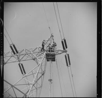 Stringing a high voltage (500kV) transmission line through a remote foothill area