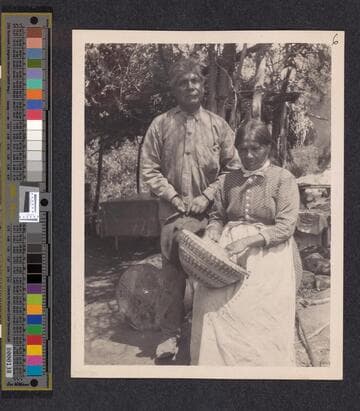 Joe and Mary Jololla with basket. Yokuts. Tule River Reservation
