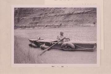 Burton Odell in his 16' boat in which he traversed Cataract Canyon