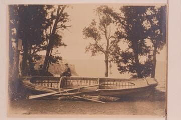 The "Utah" at the South Rim of Grand Canyon.The "Utah" was the boat operated by Russell which completed the traverse from Greenriver, Utah, to Needles.It was taken to the South Rim for exhibit and later destroyed by order of Park Supt. Tillotson