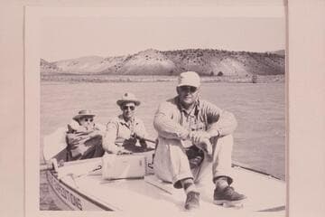 Wright party on the Green River:  Kent Frost is at the oars, Fern Frost is bundled in the bow and Mel Hurley sits on the stern