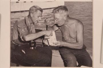 Wayne Hiser and Howard Welty dig into the ice cream at the end of the 1948 traverse of the Grand Canyon